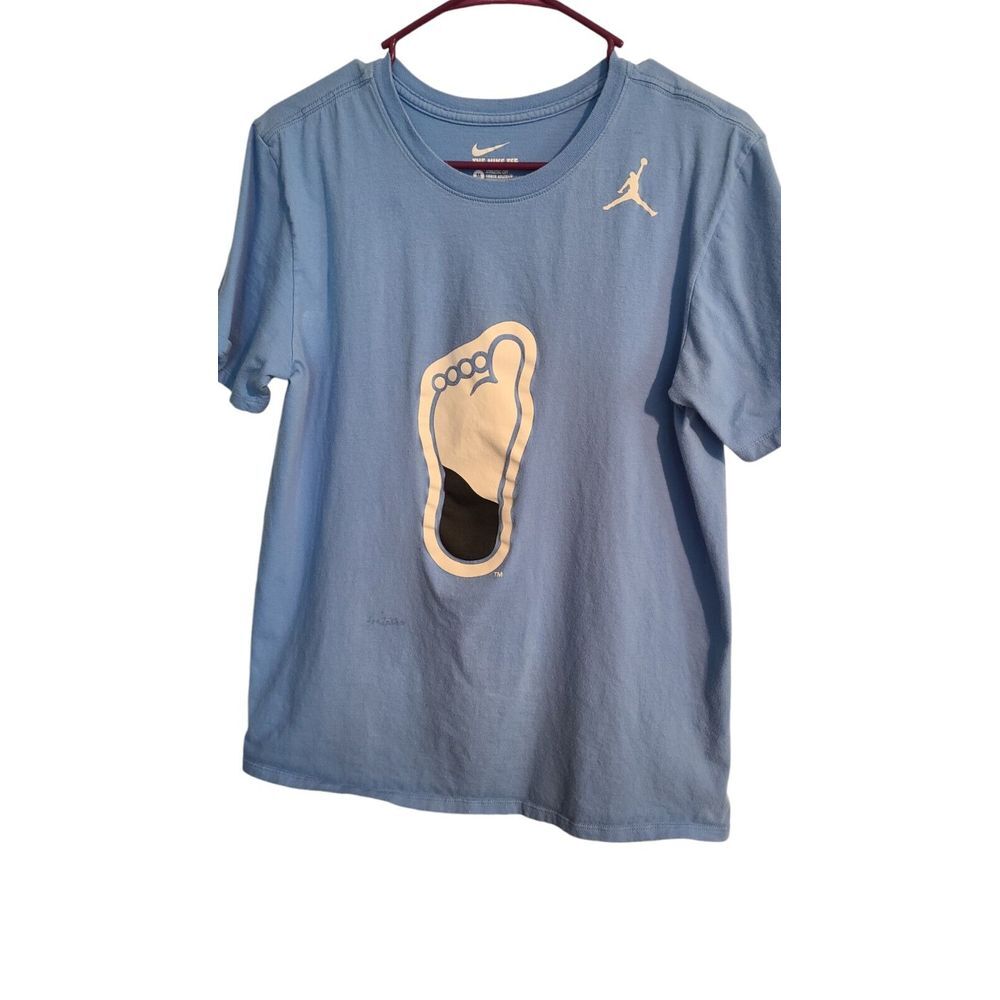 The Nike Tee shirt Size Med Tarheel #23 Jordan
